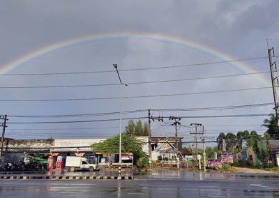 rainbow over main road in Bang Niang, Khao Lak