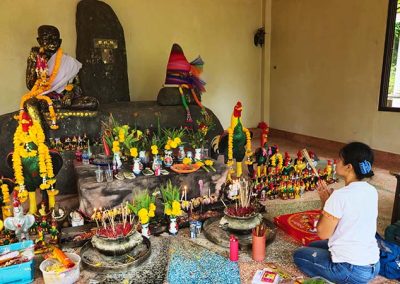 Bussaba praying in Khao Lak temple.
